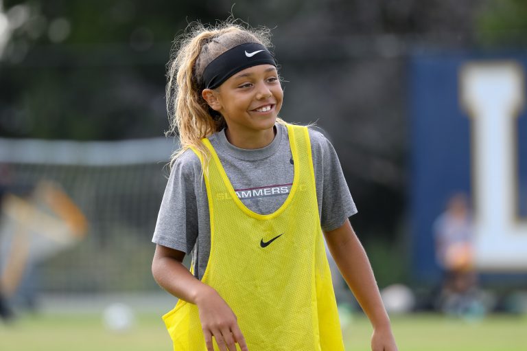 Makena Cook smiling at Slammers FC training