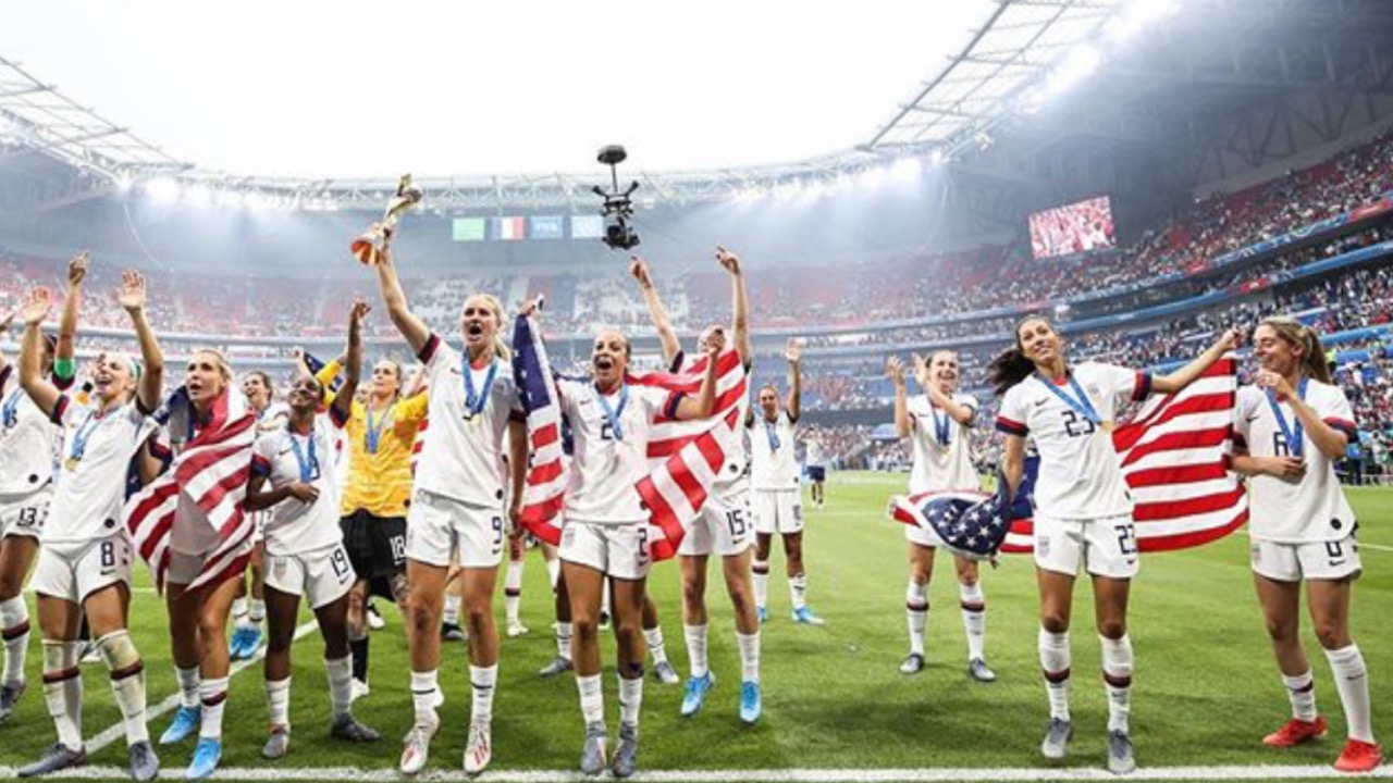 Group photo of USWNT celebrating